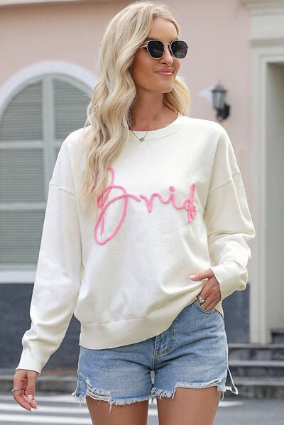 Letter Graphic Round Neck Sweater - Premium  from Trendsi - Just $41! Shop now at ZLA